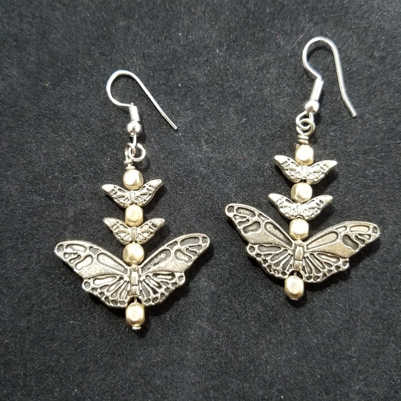 Whimsical Silver-Toned Butterfly Charm Dangling Handcrafted Earrings - Picture 2 of 6